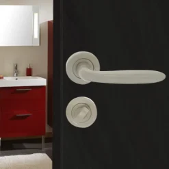Poignées de porte sur rosaces ligne Égée - finition nickelé mat CADAP